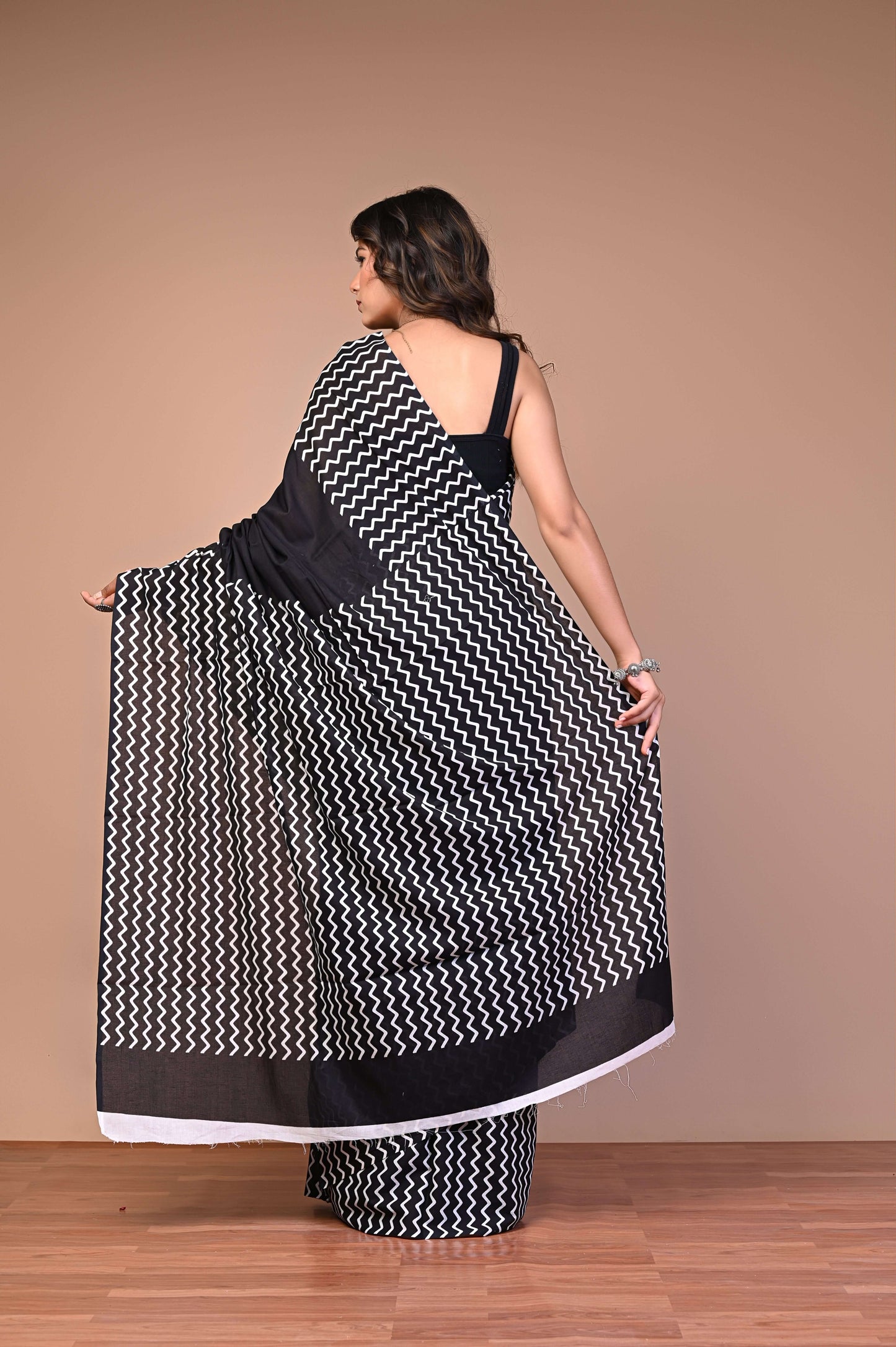 Dabu Printed Cotton Mul Saree By Printed Threads fabric texture detail highlighting lightweight weave