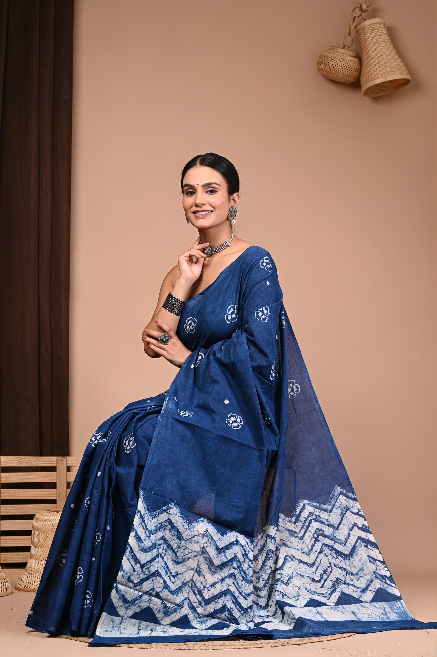 Cotton HandBlock Printed Saree in navy blue featuring intricate white motifs and a stylish neckline.