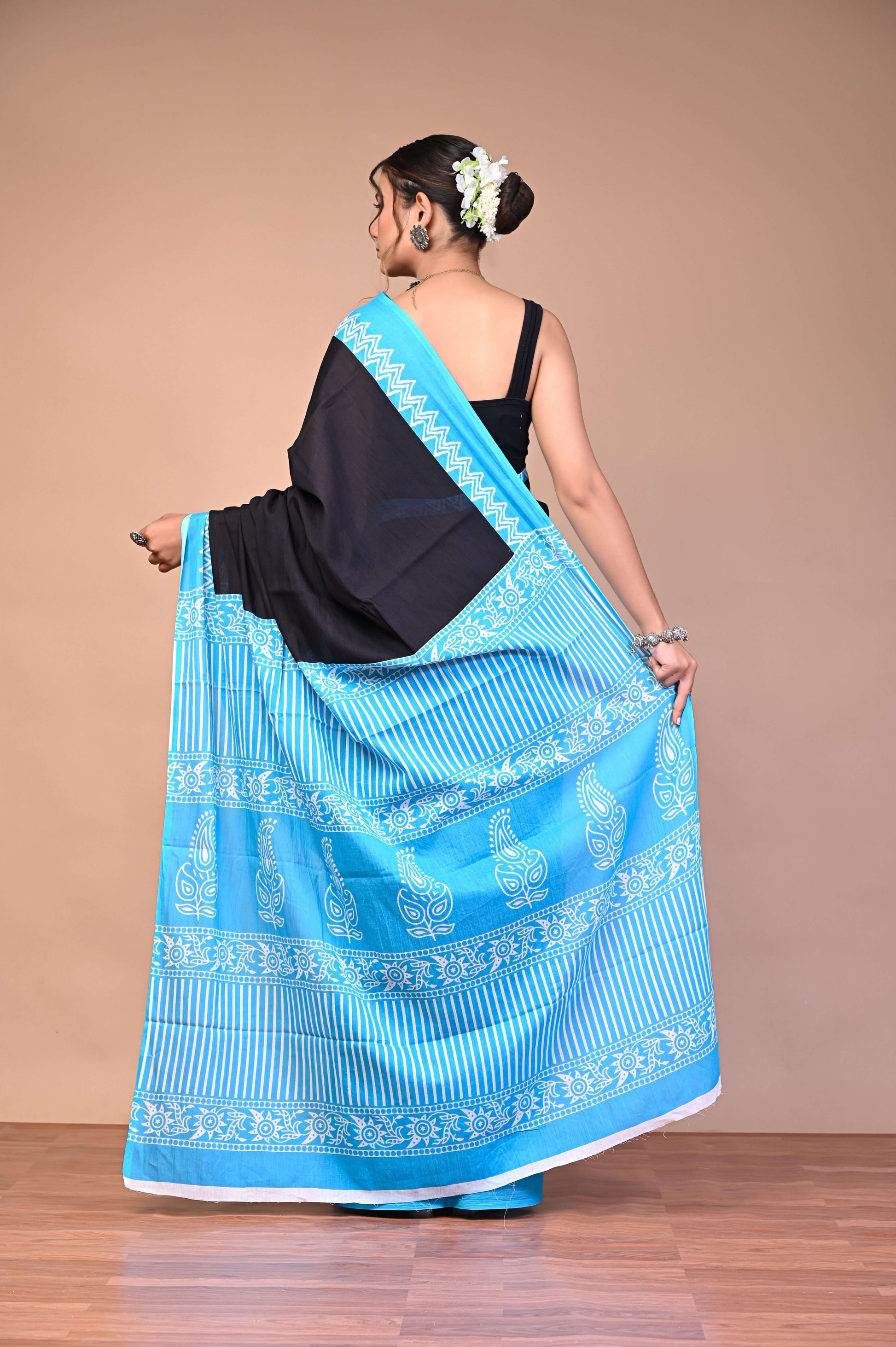 Elegant Black SkyBlue Zigzag Border Cotton Mul Saree showcasing soft premium fabric and elegant design.