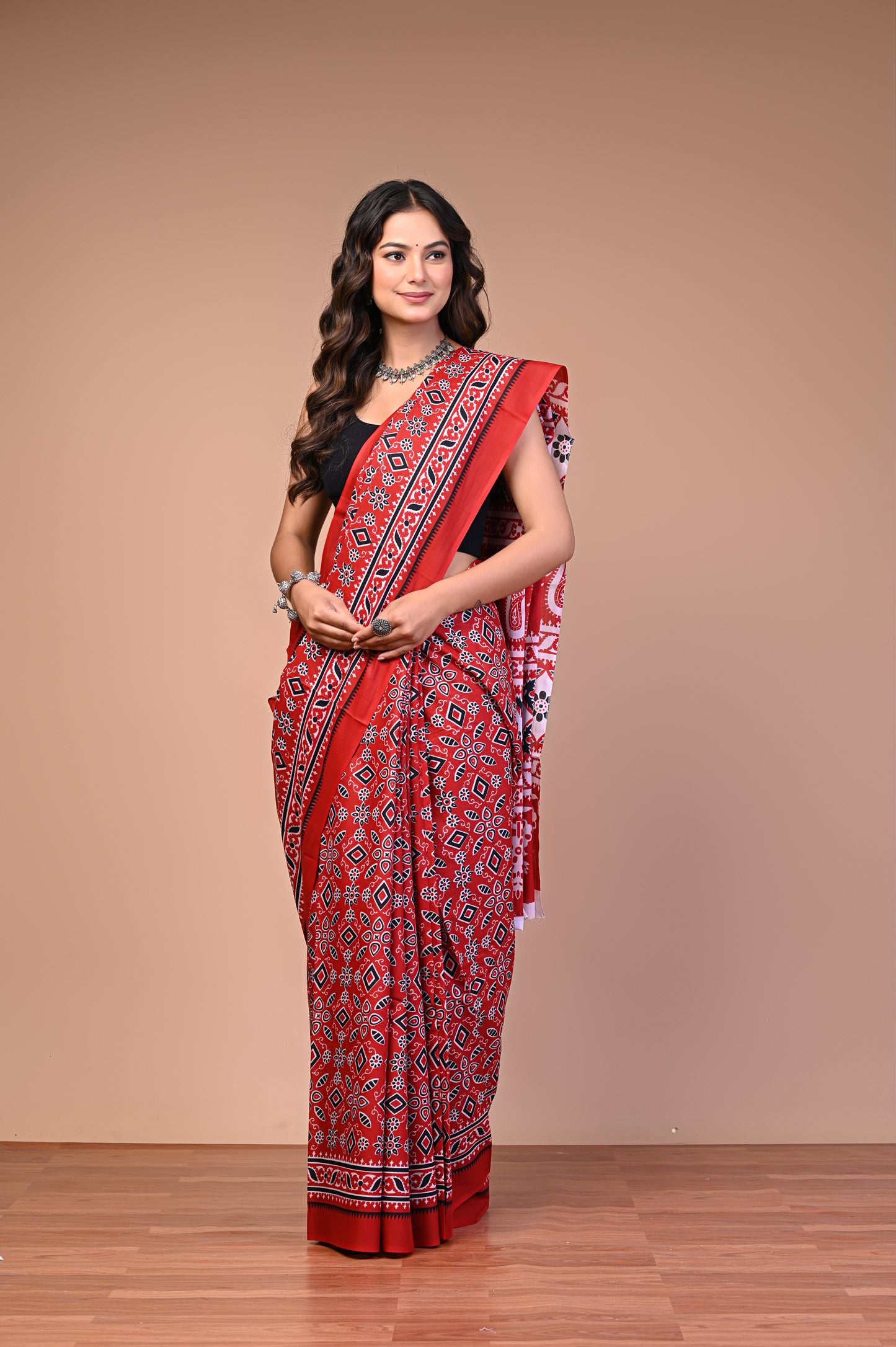 Ajrakh Printed Cotton Mul Saree in red with traditional geometric motifs
